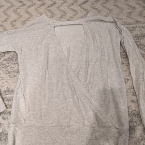 Athleta oatmeal colored pullover with open back